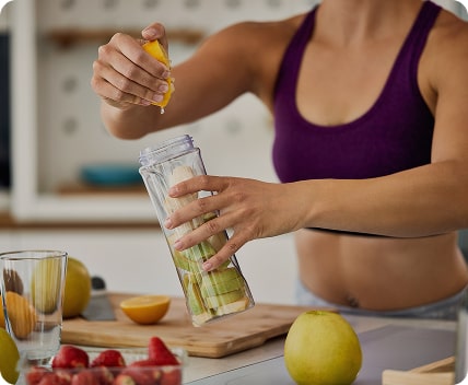 girl making a smoothie